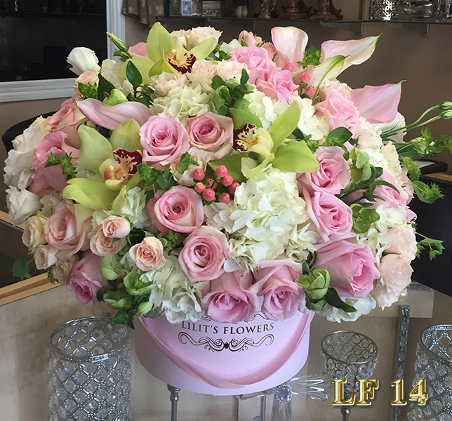 Florist in Glendale Flower Delivery - All that is beautiful and love is in 
                                                    this arrangement. 
													Make sure to share with us your arrangement.
                                                    https://goo.gl/maps/Jgj1JeCetJv - Purple roses, purple dendrobium orchid - Glendale Florist