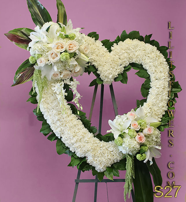 all white ravishing floral arrangement funeral open heart