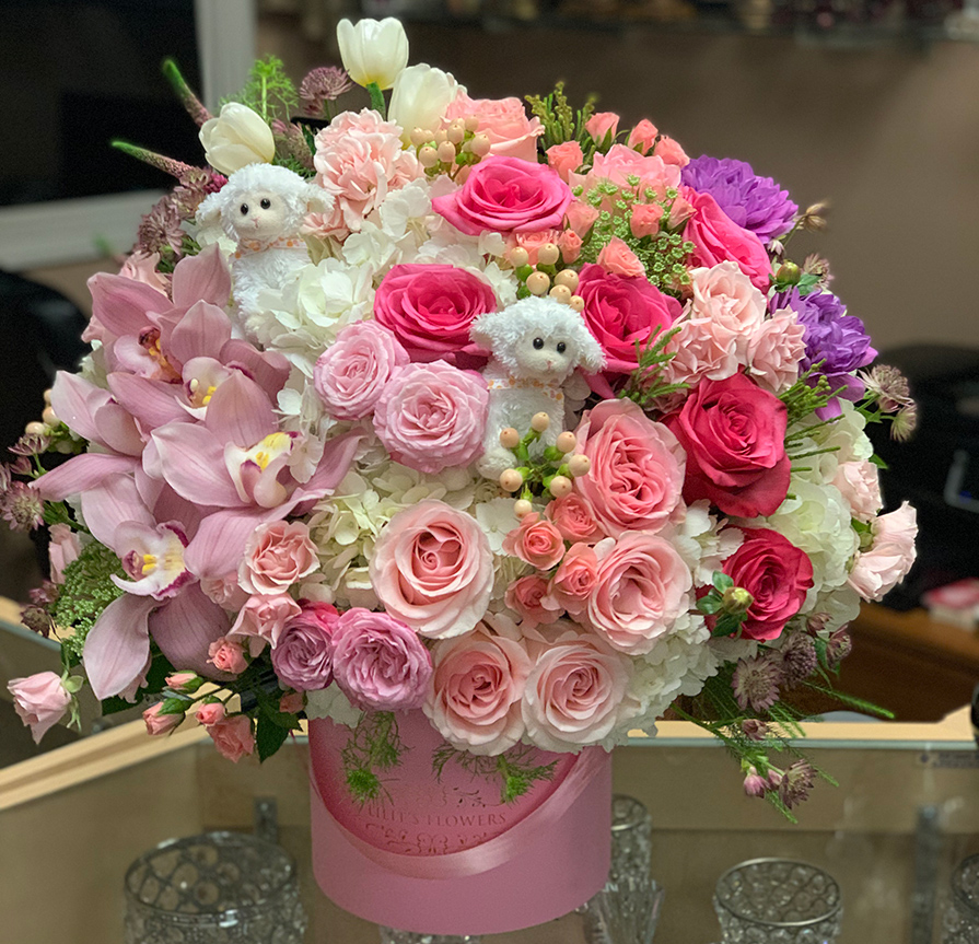 elegant bouquet in the pink hat box, pink veronicas, pink spray roses