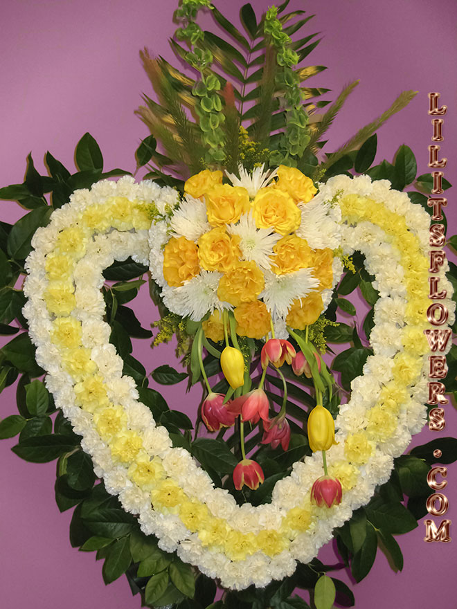 Sympathy Florist in Glendale Flower Delivery -open heart white and yellow carnations, tulips, yellow roses
Lilit's Flowers is the premier sympathy flower shop for the Glendale and the surrounding towns. Order flowers online from Glendale Florist for same day local flower delivery from conveniently located shops in Southern California to send flowers to Glendale, Los Angeles,  Hollywood, Echo Park, Silver Lake, Atwater Village, Burbank, Sherman Oaks, La CaƱada, Flintridge, Pasadena, San Marino, Alhambra, Arcadia, Thousand Oaks, Tarzana, Tujunga, La Crescenta,Toluca Lake and more.
Make sure to share with us your arrangement.
 https://goo.gl/maps/Jgj1JeCetJv - open heart with white and yellow carnations - Glendale Sympathy Florist