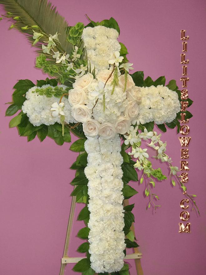 Funeral Florist in North Hollywood, CA Flower Delivery - beautiful funeral cross composed of white roses, white carnations, white -
Lilit's Flowers is the premier sympathy flower shop for North Hollywood and the surrounding towns. Order flowers online from Glendale Florist for same day local flower delivery from conveniently located shops in Southern California to send flowers to Glendale, Los Angeles,  Hollywood, Echo Park, Silver Lake, Atwater Village, Burbank, Sherman Oaks, La Cañada, Flintridge, Pasadena, San Marino, Alhambra, Arcadia, Thousand Oaks, Tarzana, Tujunga, La Crescenta,Toluca Lake and more.

Make sure to share with us your arrangement.
 https://goo.gl/maps/Jgj1JeCetJv - cross mix flowers  - sympathy flowers North Hollywood